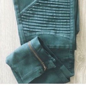 Emerald green moto jeggings.